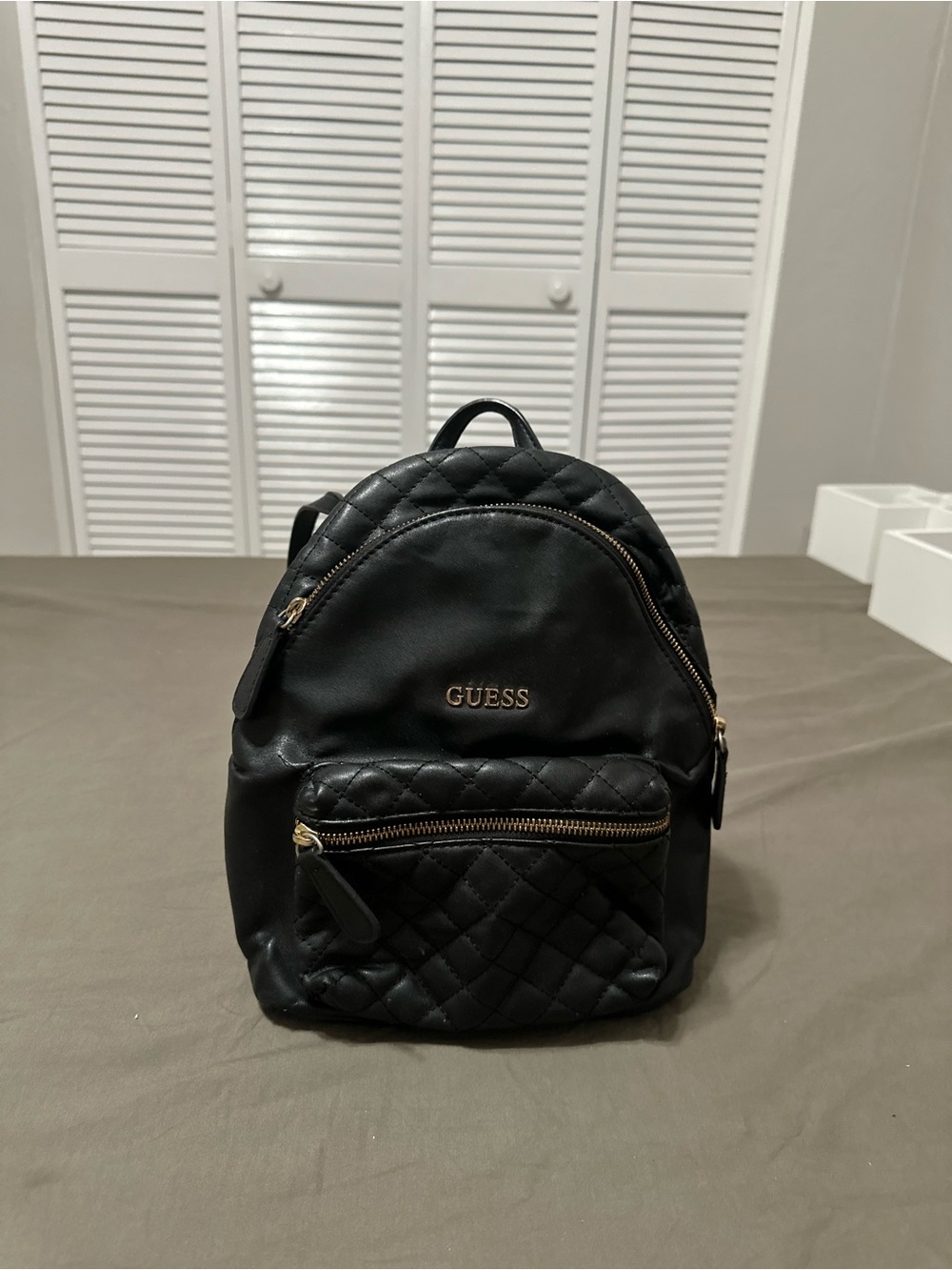 GUESS Black Quilted Mini Backpack with Gold Hardware